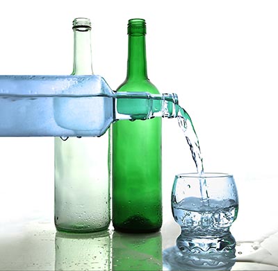 Official advice: 9½ cups of fluids a day for women and 12 cups a day for men.