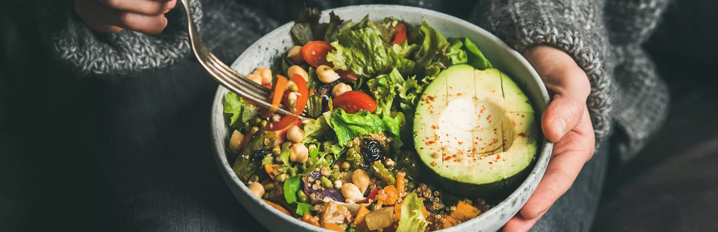 grain bowl with vegetables and avocado
