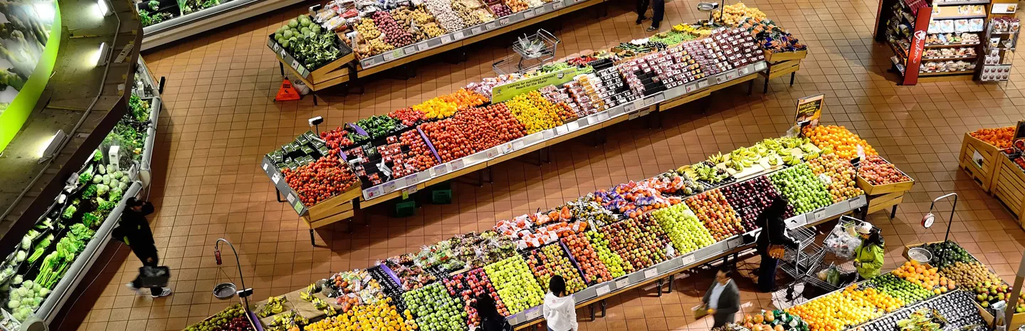 overhead view of a supermarket produce aisle