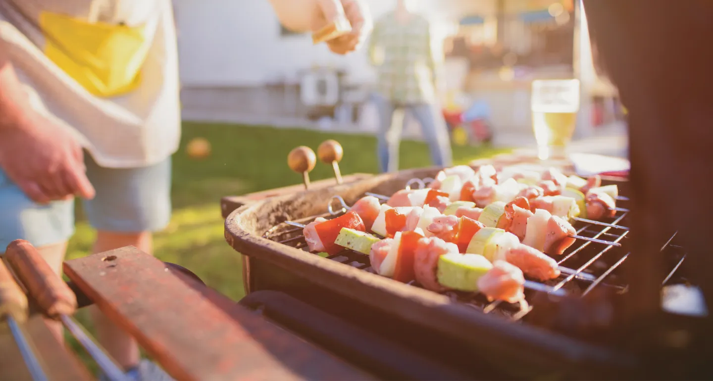 kabobs on a grill at a summer barbecue