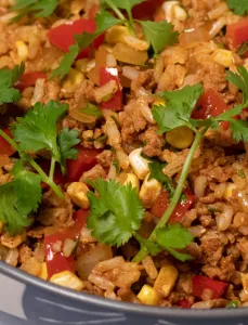 dish of fried rice, garnished with cilantro