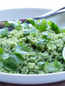 white bowl with cilantro and lime quinoa