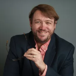 Headshot of Philip Kahn-Pauli