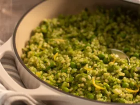 a pot of green risotto
