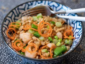 Bowl filled with various vegetables and fried rice