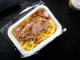 frozen spaghetti bolognese on a table
