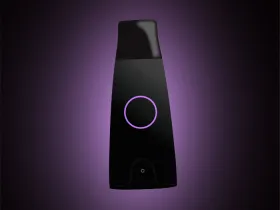 Lumen metabolism reader with purple glow around it on a black background