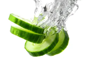 cucumber slices splashing into water