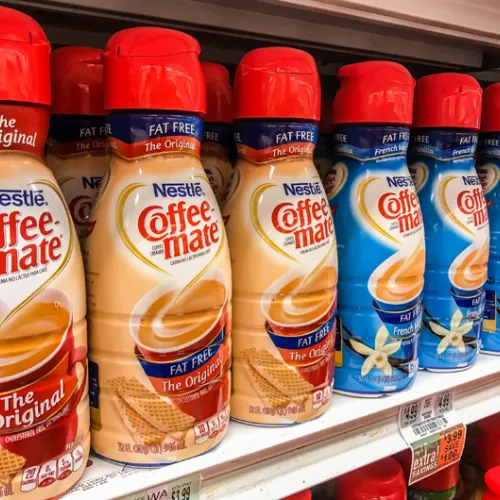 grocery store shelf of coffee mate coffee creamers