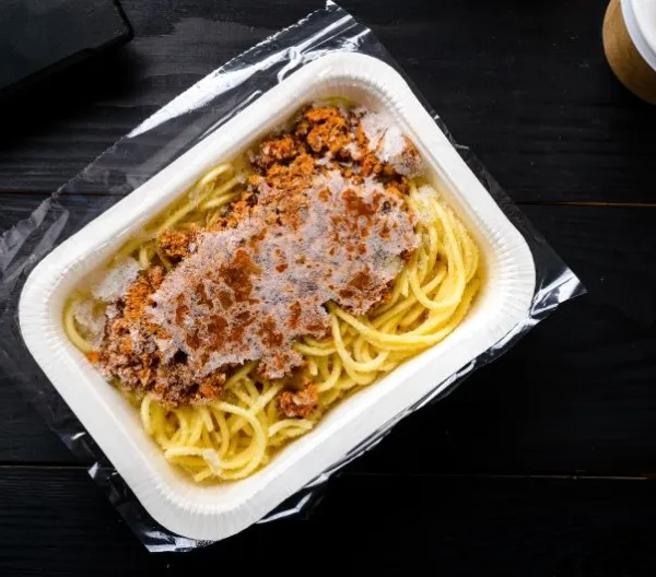 frozen spaghetti bolognese on a table