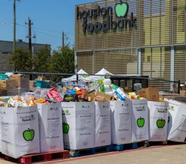 Local charity food bank preparing food kits during national emergency