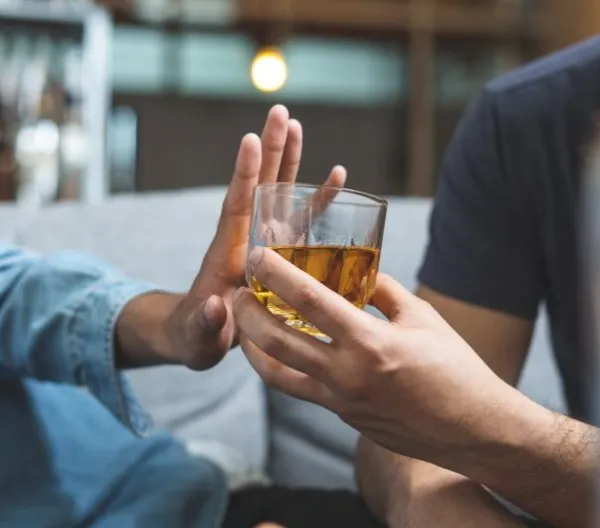 Stop alcohol concept. Person refuses to drink alcohol.