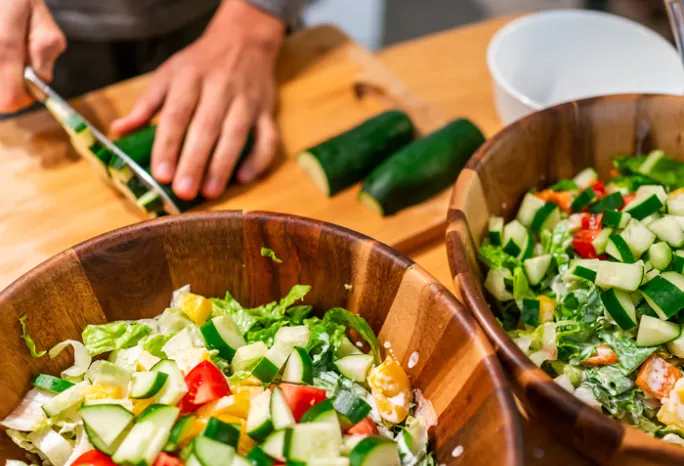 a man cutting vegetables