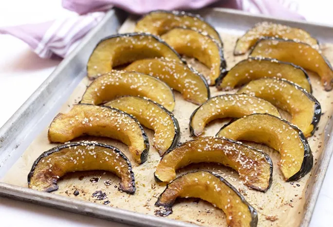 maple sesame winter squash on sheet pan