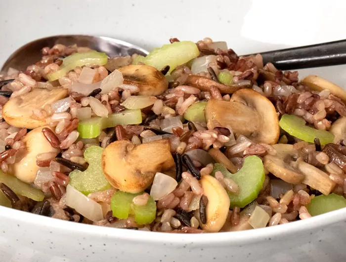 wild rice, mushrooms, and celery in a bowl