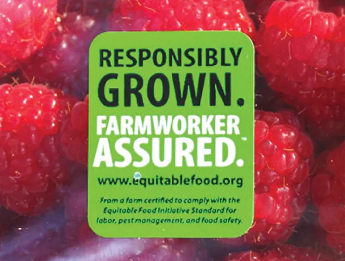 package of raspberries with sticker