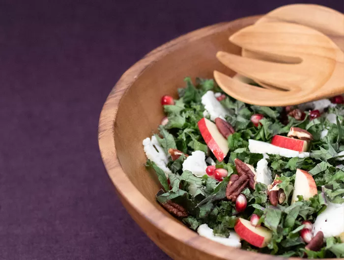 kale salad with fruit and nuts