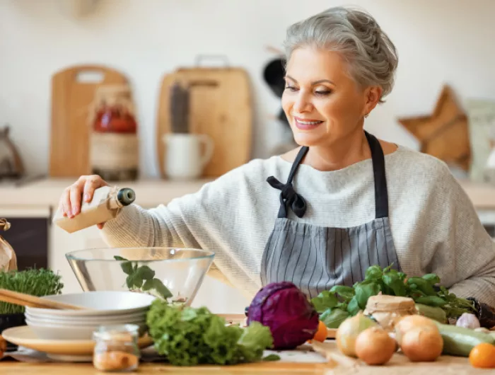 woman making salad