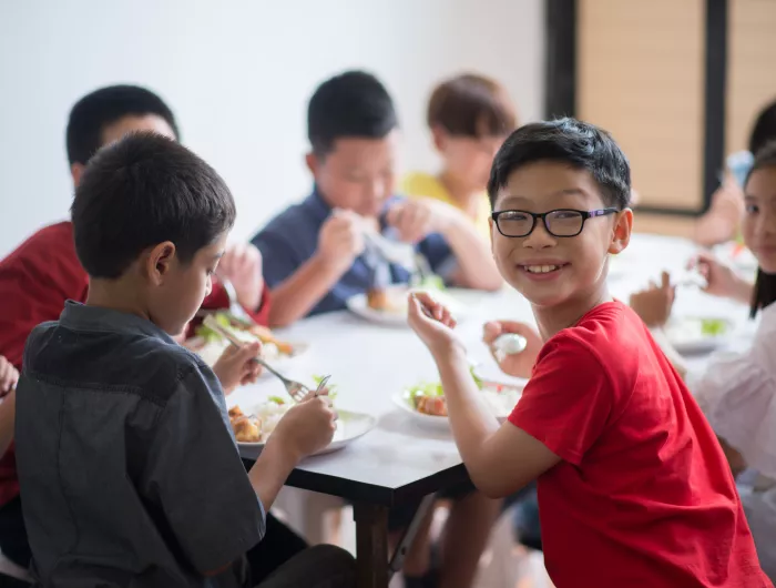 Children eating lunch together