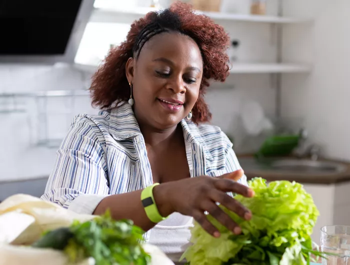 woman making a salad