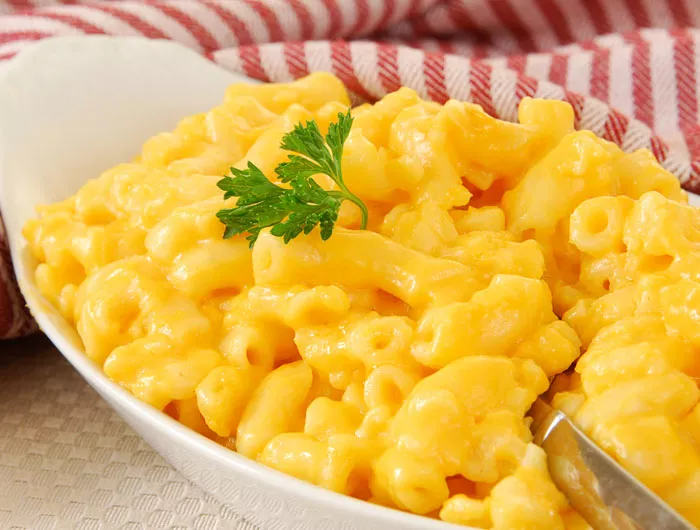 large bowl of mac & cheese in white bowl