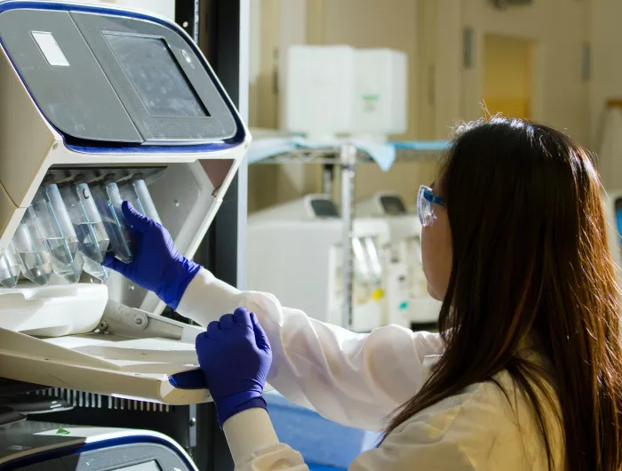 A woman in a testing lab