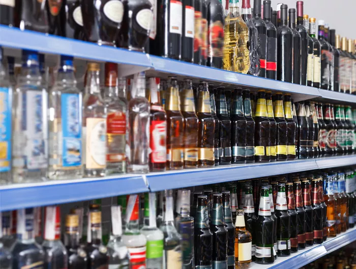Alcohol bottles on shelves