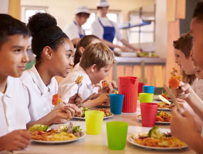 Children eating school lunch