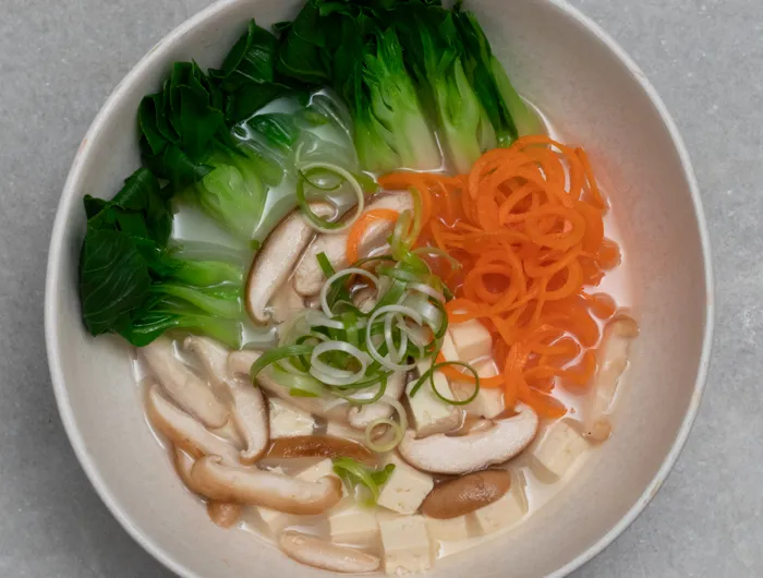bowl filled with vegies sitting in miso broth