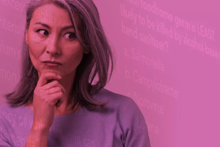 a woman contemplating quiz questions