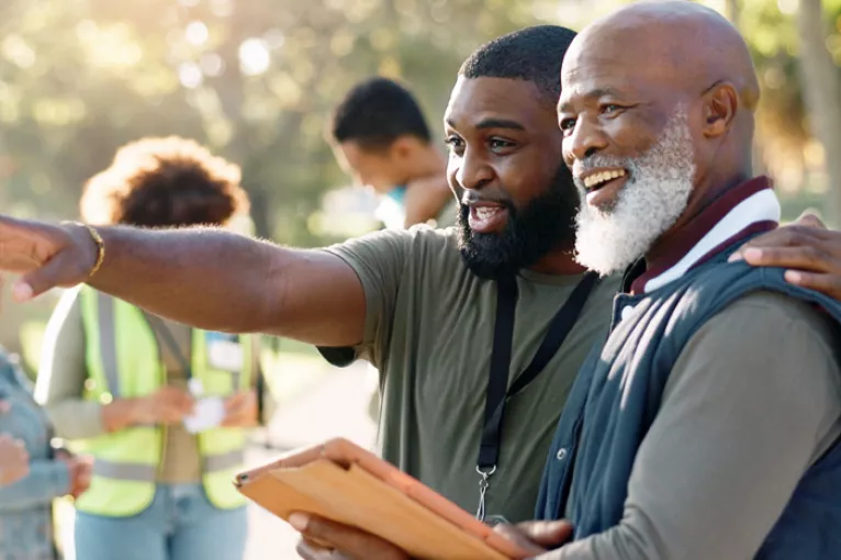 Two men at a community event