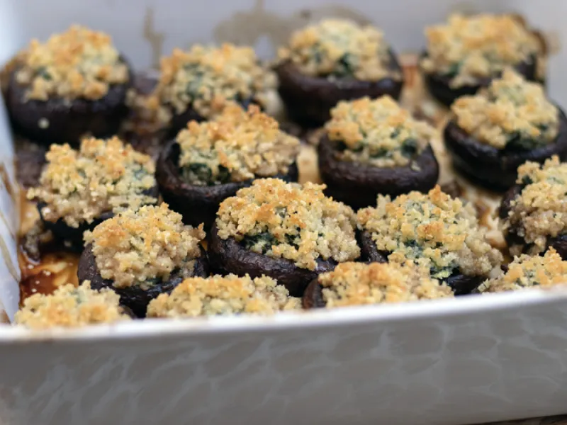 metal pan filled with stuffed mushrooms