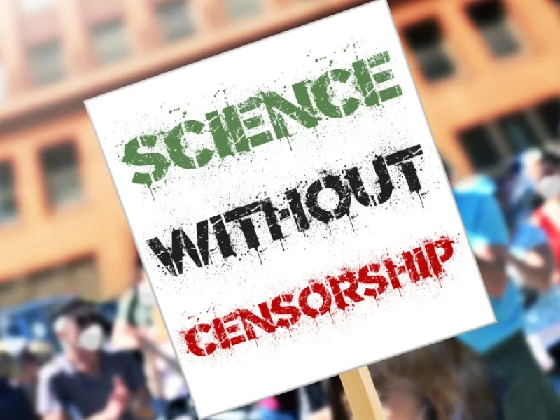 A protest sign reading SCIENCE WITHOUT CENSORSHIP