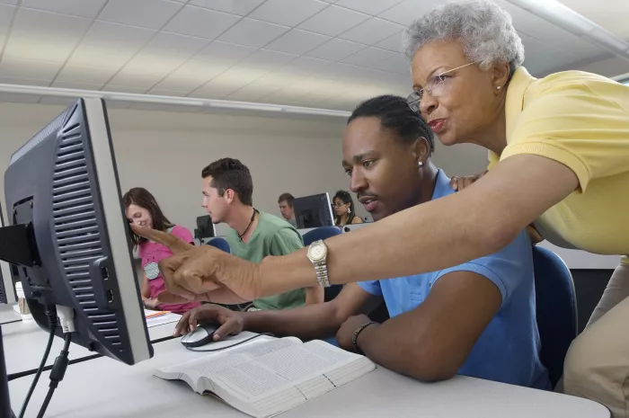 woman teaching on the computer