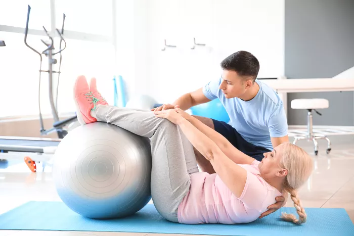 woman using exercise ball