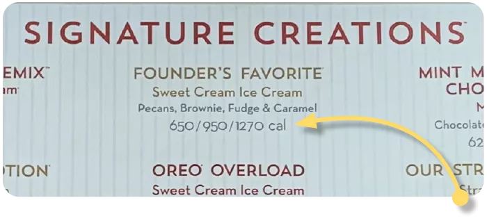 Cold Stone menu board showing calorie amounts for signature creations