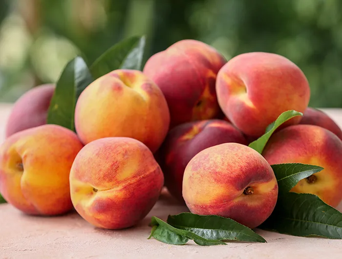 Peaches on a table