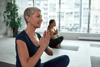 women doing yoga in a studio