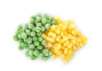 pile of frozen peas and frozen corn