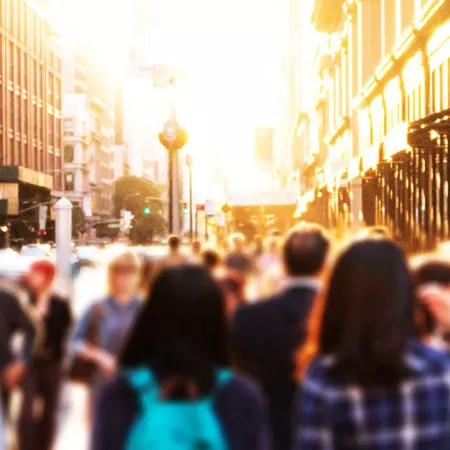 people walking on a city street
