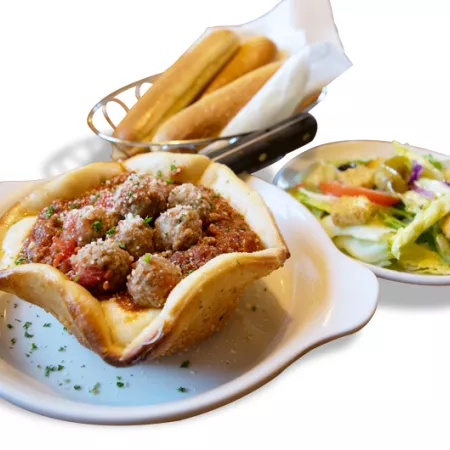olive garden's meatball pizza bowl with breadsticks and side salad