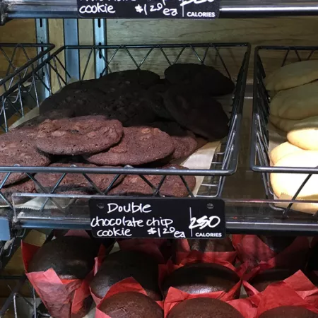 cookies in grocery store labeled with calorie count.