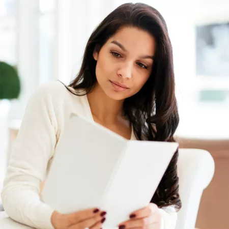 woman reading a menu