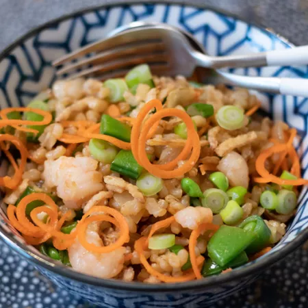 Bowl filled with various vegetables and fried rice