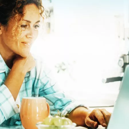 woman looking at laptop screen