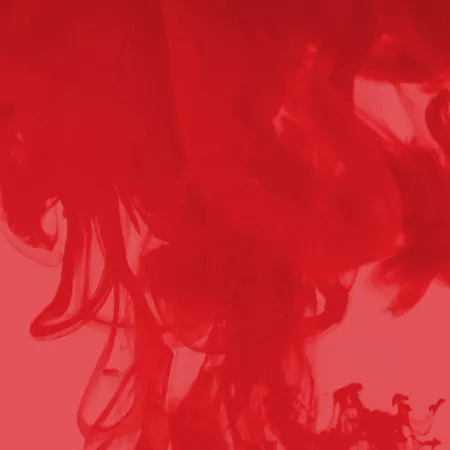 splatter of red die in liquid